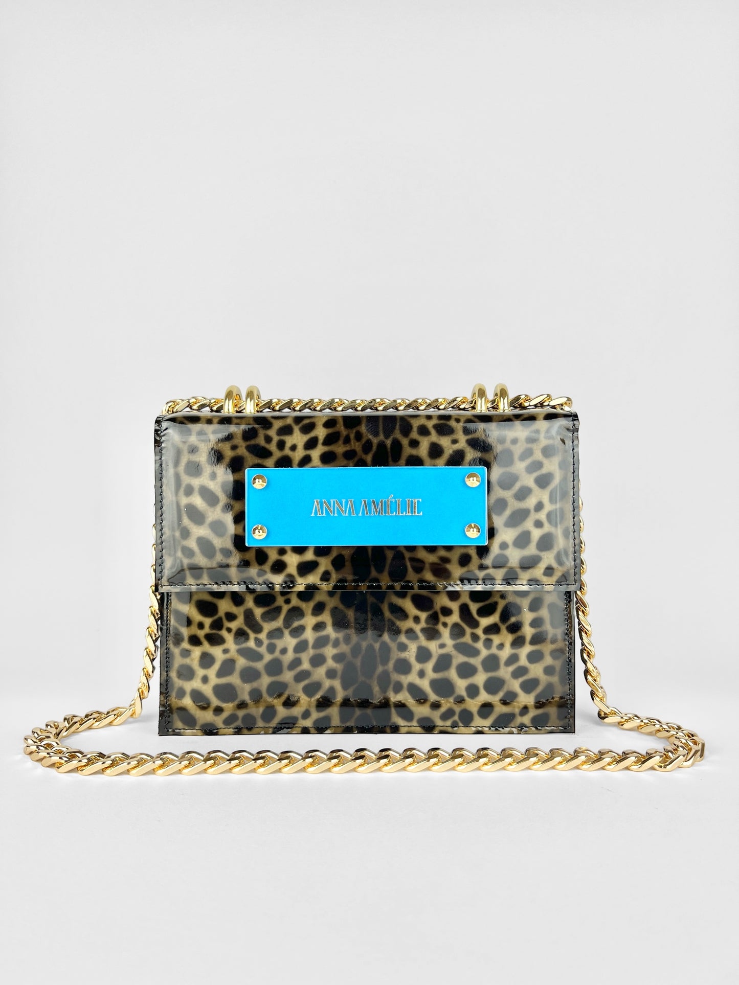 APRIL BAG | LEOPARD PATENT LEATHER w. BRIGHT BLUE LOGO ACCENT
