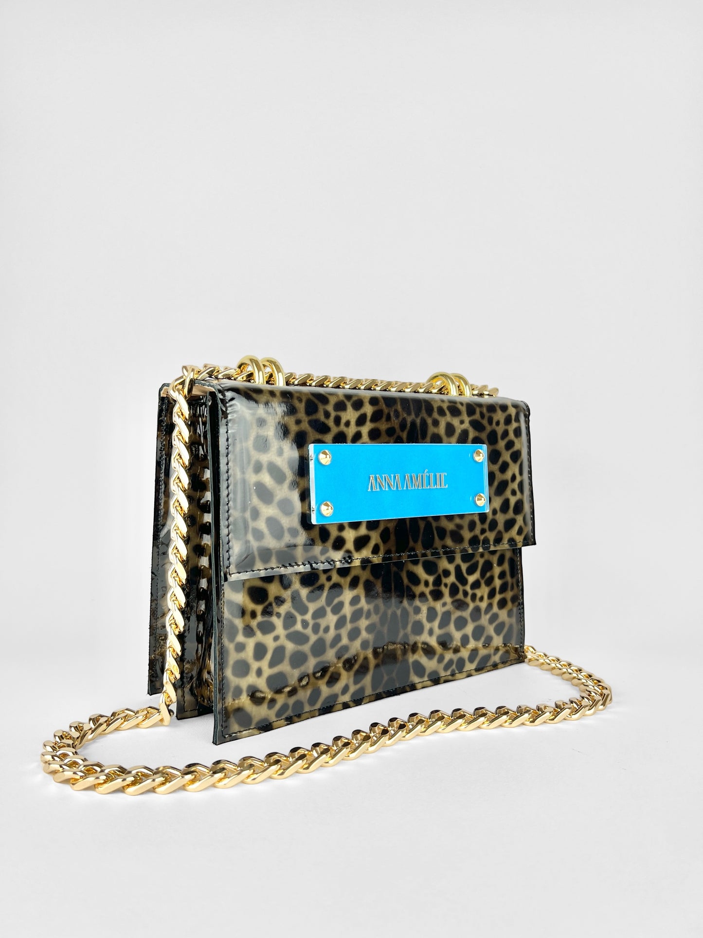 APRIL BAG | LEOPARD PATENT LEATHER w. BRIGHT BLUE LOGO ACCENT