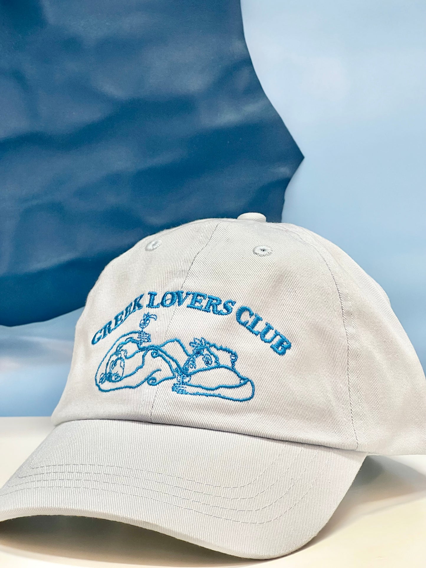 VRYSI BASEBALL CAP - “GREEK LOVERS CLUB” | PALE BLUE